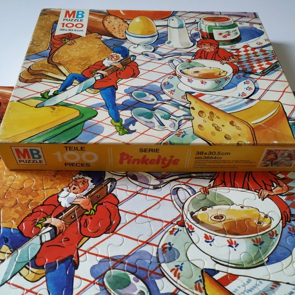 Puzzel Pinkeltje – 100 stukjes – afbeelding met brood-kaas-boter (1)