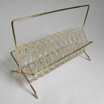 Vintage metalen goudkleurig rekje met 11 glazen onderzetters