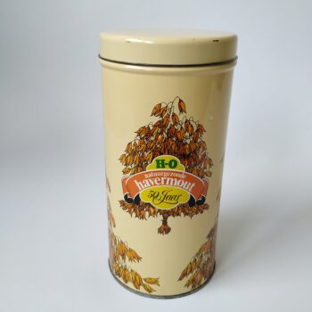 Vintage blik / bus Havermout met de tekst natuurgezonde havermout en afbeeldingen van haver.