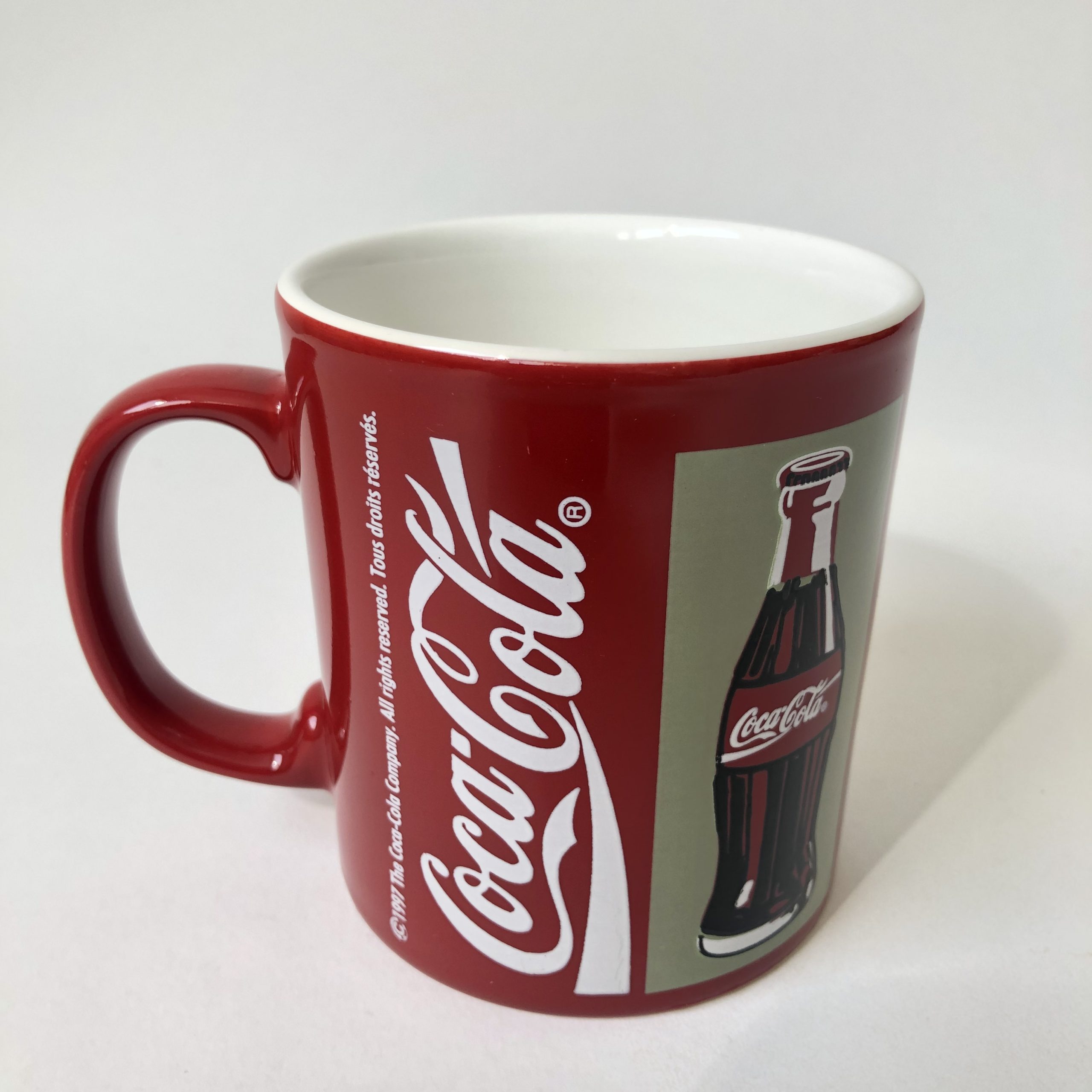 Vintage aardewerk rode mok Coca Cola uit 1997