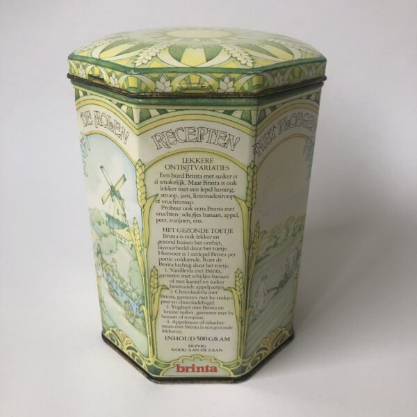 Blik - trommel (achthoekig) van Brinta - hoogte 17 cm - diameter 11,5 cm (2) Vintage achthoekig blik/trommel van Brinta met mooie decoratie en teksten