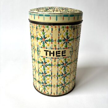 Vintage decoratief blik Thee in reliëf en vrolijke kleuren