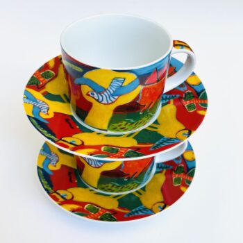 Vintage kop en schotel naar een ontwerp van Corneille getiteld L’été commencant (de zomer begint)