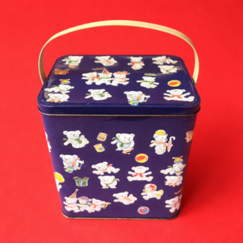 Vintage decoratief blik Beren met een hengsel