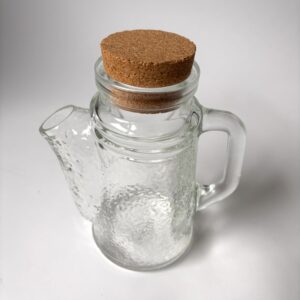 Vintage grote glazen pindastrooier/pindadispenser met kurken dop van WMF