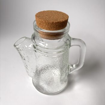 Vintage grote glazen pindastrooier/pindadispenser met kurken dop van WMF