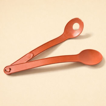 Vintage slabestek 2-delig van Tupperware met in elkaar grijpende handgrepen uit de jaren 70