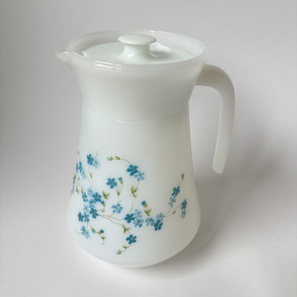 Vintage water/sap kan met een vergeet-me-nietjes bloemenpatroon