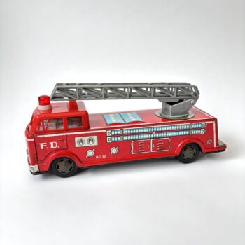 Vintage blikken speelgoed brandweerauto met uitschuifbare ladder