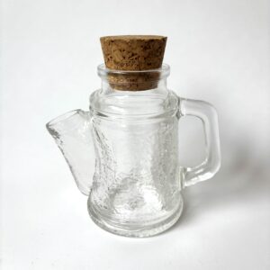 Vintage glazen pindastrooier/pindadispenser met kurken dop van WMF