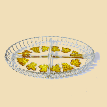 Vintage ovale serveerschaal Walther Glass met gele decoratieve bladeren